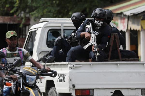 Police patrol the area due to gang activity that has forced residents to flee their homes, in Port-au-Prince, Haiti October 20, 2024. REUTERS/Ralph Tedy Erol