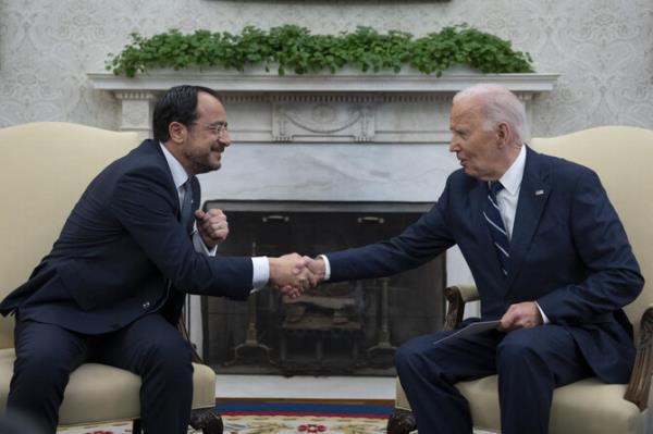 US President Joe Biden shakes hands during a meeting with President of Cyprus Nikos Christodoulides, left, in the Oval Office of the White House in Washington, Wednesday, Oct. 30, 2024. (AP)