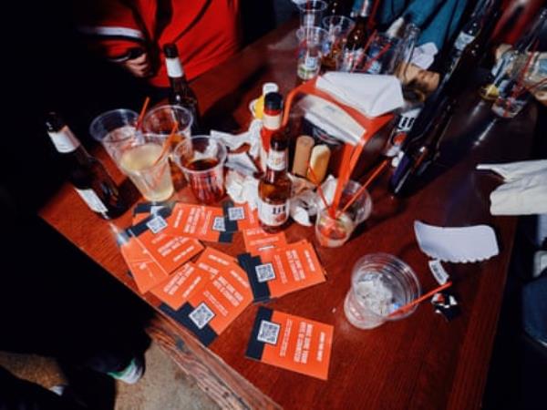 Drinks and pamphlets on table